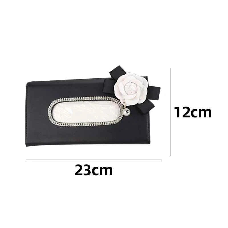 Black floral tissue holder measuring approximately 23 centimetres wide by 12 centimetres high