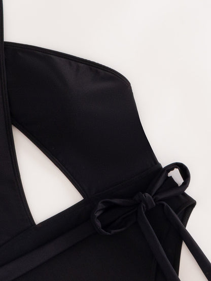Traje de baño de una pieza para mujer con tirantes cruzados y color liso